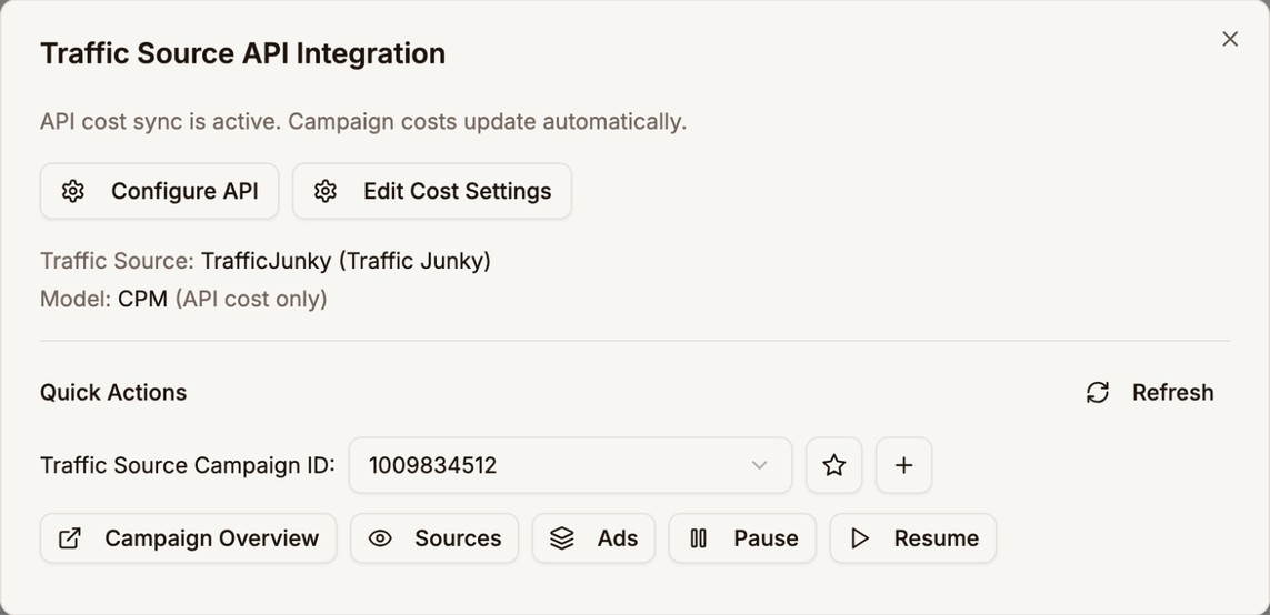 The Traffic Source API Integration window for TrafficJunky, with cost sync active, the CPM model, the traffic source campaign ID 1009834512, and the Campaign Overview, Sources, Ads, Pause, and Resume buttons