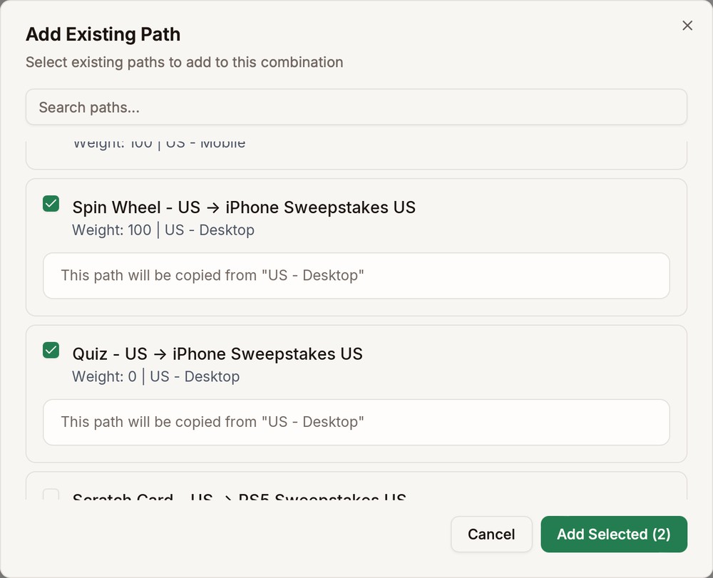 The Add Existing Path dialog with two paths from US - Desktop ticked, each with a note that it will be copied from US - Desktop, and the Add Selected (2) button